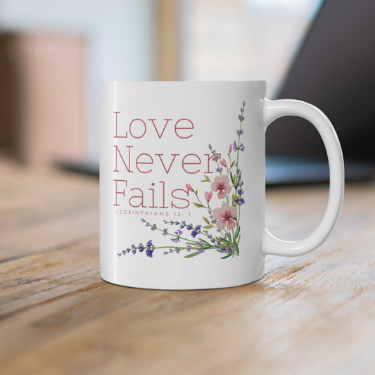 Love Never Fails Christian Coffee Mug